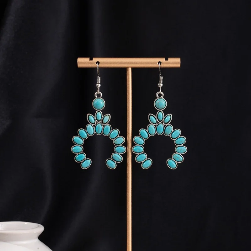 Long dangling turquoise earrings horse shoes